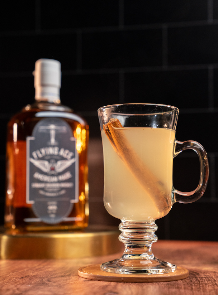 Hot toddy cocktail recipe with cinnamon stick